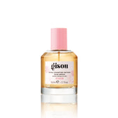 Hair perfume bottle with pink cap.